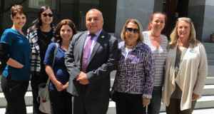 Assemblymember Freddie Rodriguez with SEIU 121RN Registered Nurses (left to right) Marie Spaner, Jinky Montiel, Miriam Cortez, 121RN President Gayle Batiste, Susie Hinkel, and Kathy Hughes outside the California legislative building where the Judiciary Committee passed AB 1102.